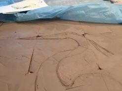 The sketching in clay begins